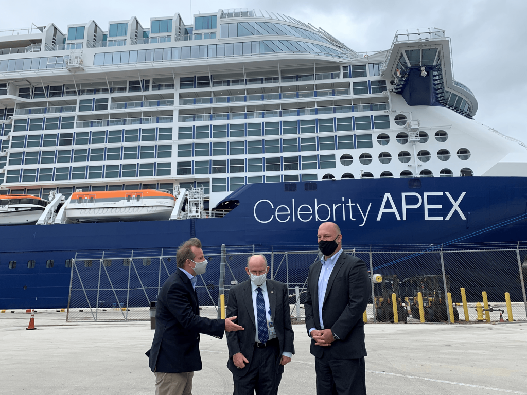 Commissioner Louis Sola (L) speaks with Jonathan Daniels (R) and Glenn Wiltshire(C), both of Port Everglades.  The Celebrity Apex, delivered earlier this year, is homeported at the facility for the winter.