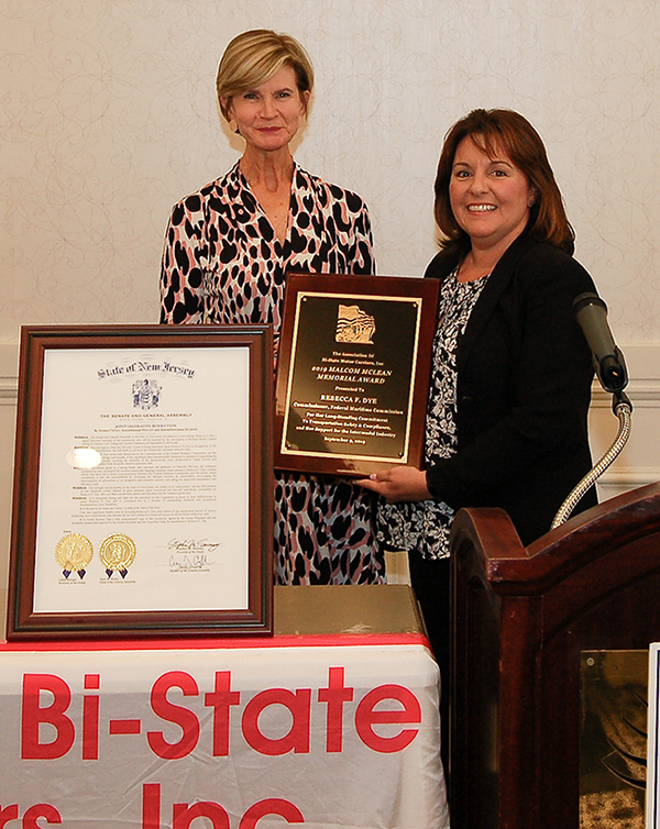 Commissioner Rebecca Dye (Left) receives Malcom McLean Award from Lisa Yakomin, President of Association of Bi-State Motor Carriers