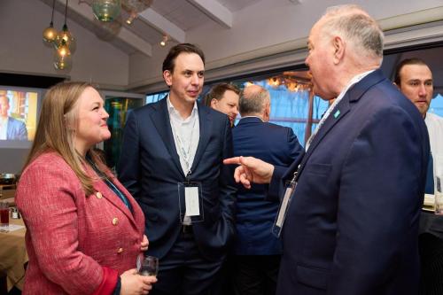 Commissioner Vekich (Right) discussing the future of digitalization with Dominique Willems (Center) of DCSA and Lauren Beagan (Left) of Squall Strategies.